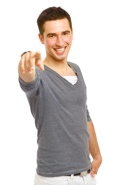 Young smiling guy pointing at you - Foto, afbeelding