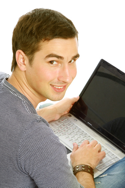 Guy  with a laptop - Фото, изображение