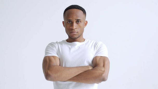Happy African American man in white t-shirt isolated on white background Studio stand posing - Photo, Image