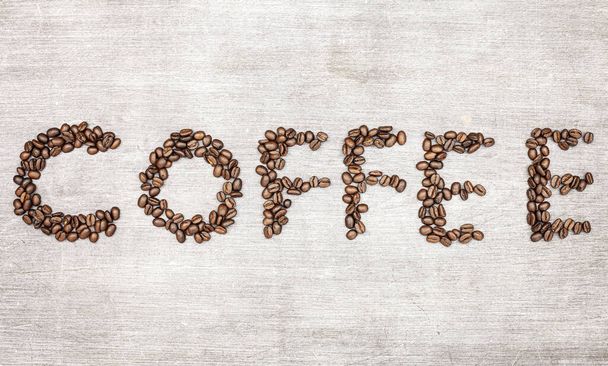 焙煎したばかりのコーヒー豆の背景 - 写真・画像