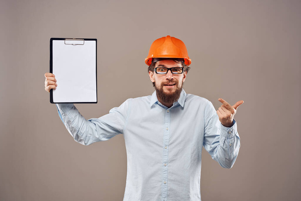 Worker man orange hard hat construction industry manual - Foto, Imagem