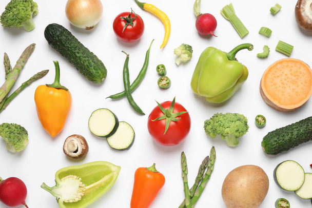 Flat lay composition with fresh vegetables on white background - Foto, immagini