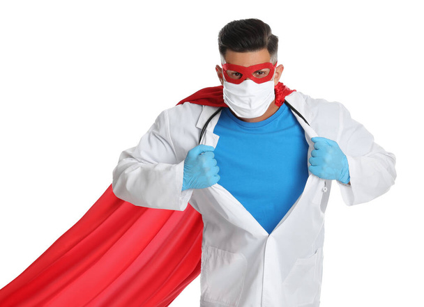 Doctor wearing face mask and cape on white background. Super hero power for medicine - Foto, Bild