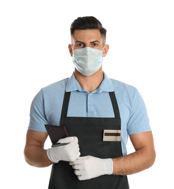 Waiter in medical mask with notepad on white background - 写真・画像