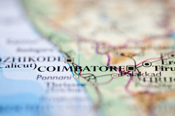 Shallow depth of field focus on geographical map location of Coimbatore Kovai India Asia continent on atlas - Photo, Image