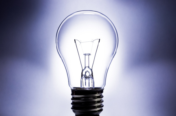 Electric light bulb with light background - Fotoğraf, Görsel
