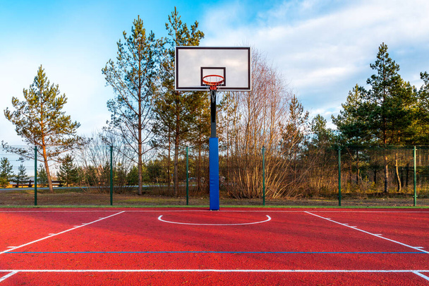 An empty basketball court found in the outdoors - Photo, Image