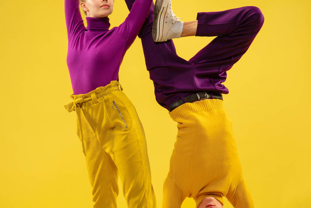 Portrait of two friends going crazy, having fun. Bright clothes, trendy colors. - Foto, Imagem