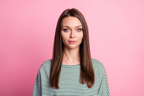 Photo of charming calm cute young lady look camera shy smile wear striped shirt isolated pink color background - Valokuva, kuva
