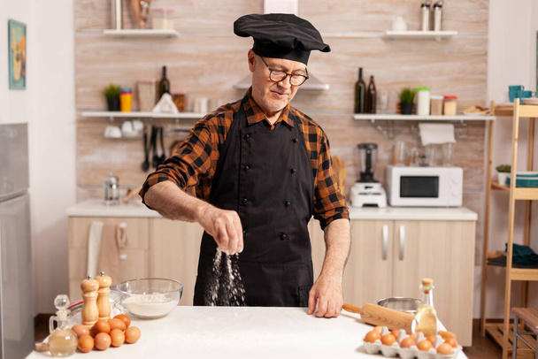 Chef wearing bonete and apron - Fotoğraf, Görsel
