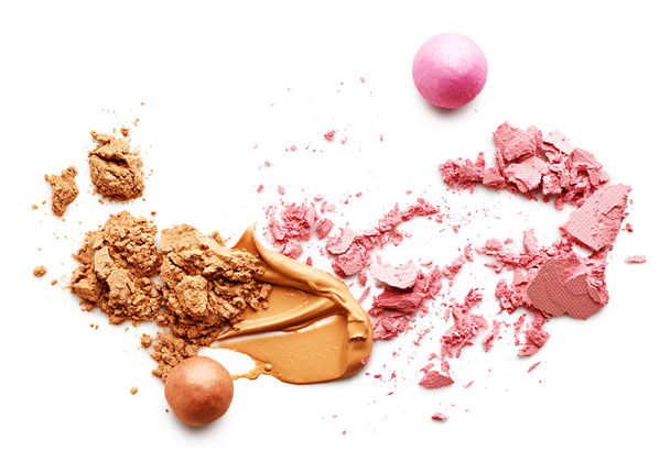Makeup foundation smear, face powder and blush isolated on white background - Photo, Image