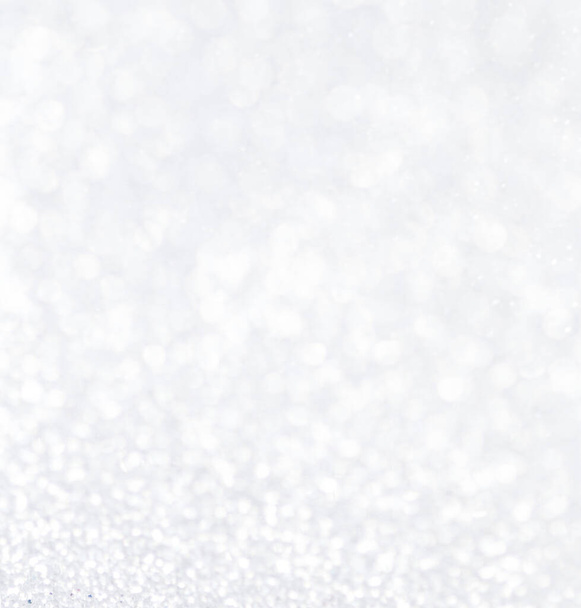 Christmas glowing Silver Background. Christmas lights. Blurred Xmas Bokeh as a Greeting card - Valokuva, kuva