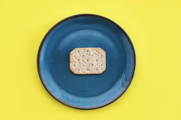 dry diet square cookies on decorative plate - 写真・画像