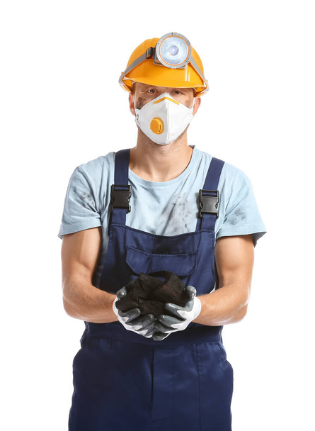 Miner man with coal on white background - Foto, imagen
