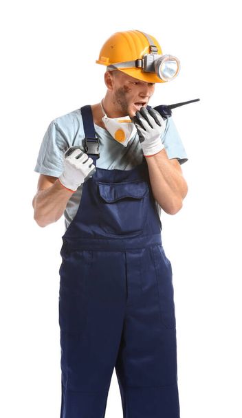 Miner man with two-way radio on white background - Photo, image