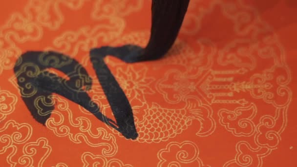 Calligraphe chinois Rédaction des couplets du Festival de printemps - Séquence, vidéo