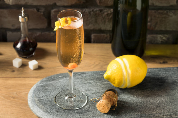 Boozy Refreshing Champagne Cocktail with Sugar and Bitters - Fotó, kép