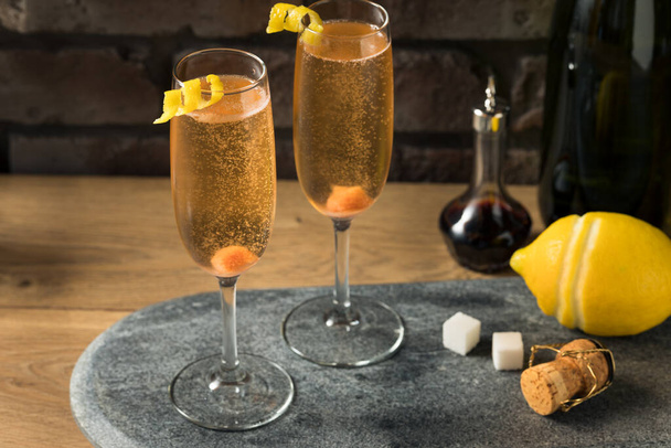 Boozy Refreshing Champagne Cocktail with Sugar and Bitters - Foto, afbeelding