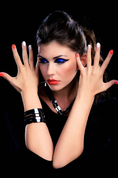 Fashion portrait of an attractive woman with colorful makeup, red lipstick and bright manicure - Φωτογραφία, εικόνα