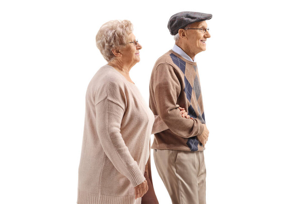 Elderly husband and wife walking isolated on white background - Photo, Image