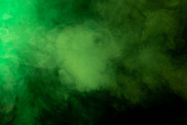 Green smoke texture on black background - Фото, зображення