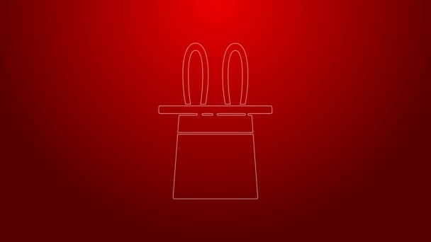 Green line Magician hat and rabbit ears icon isolated on red background. Magic trick. Mystery entertainment concept. 4K Video motion graphic animation - Footage, Video