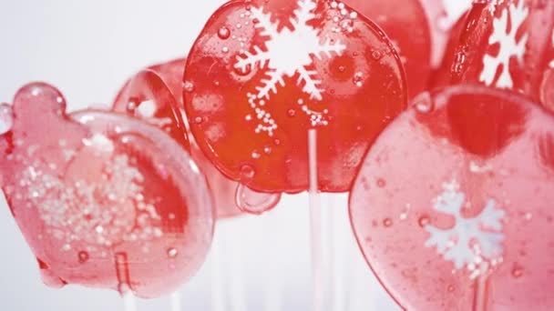 Making homemade lollipops with fondant snowflakes. - Footage, Video