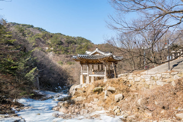 A traditional korean wooden pavilion at the Bukhansan Mountain National park in Seoul, South Korea - Photo, Image