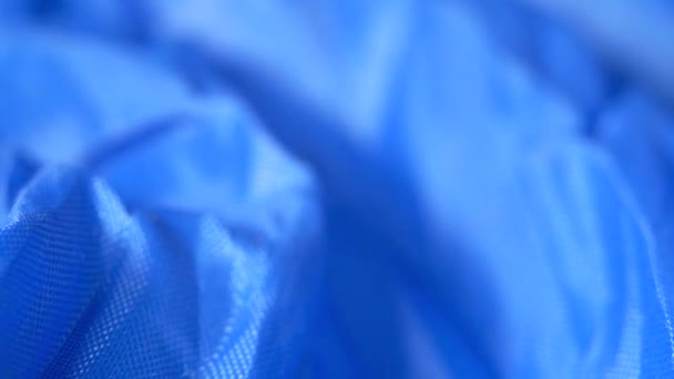 Detailní záběr modré polyesterové tkaniny. - Záběry, video