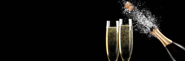 Glasses of champagne with splash, celebration theme concept - Photo, Image