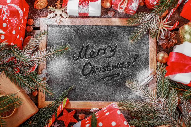 Vintage wooden Blackboard. Merry Christmas holiday concept. - Photo, Image