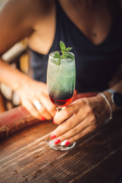 A vertical selective focus shot of a delicious cocktail - Fotoğraf, Görsel