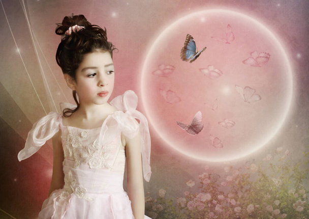 Little princess looks at the butterflies fascinated - Photo, Image