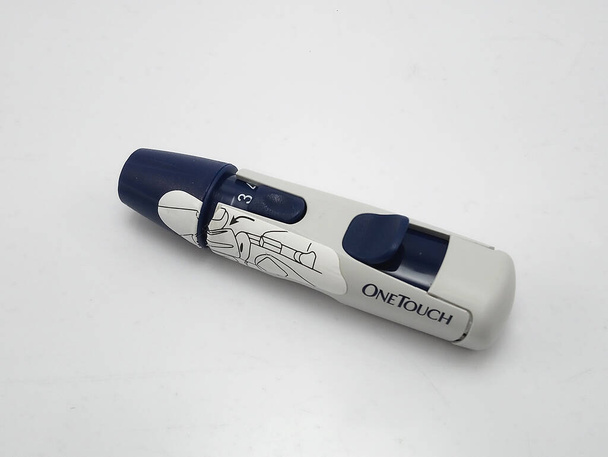 QUEZON CITY, PH - NOV 23 - One touch select simple lancet pen on November 23, 2020 in Quezon City, Filipiny. - Zdjęcie, obraz