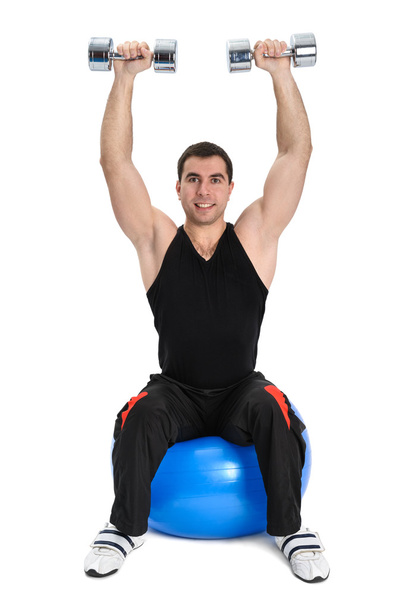 Dumbbell Shoulder Press na bola de estabilidade
 - Foto, Imagem