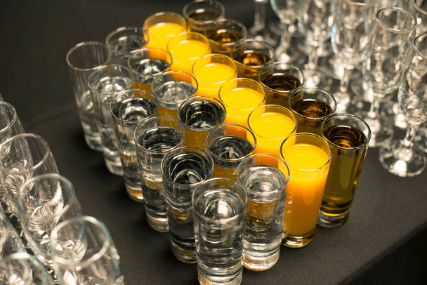 Some shots of beverages on a party table - Photo, Image
