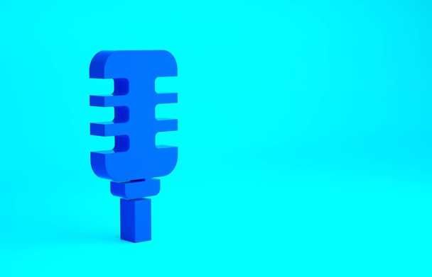 Kék mikrofon ikon elszigetelt kék háttérrel. Légi rádiós mikrofonon. Hangszóró jel. Minimalizmus koncepció. 3d illusztráció 3D render. - Fotó, kép