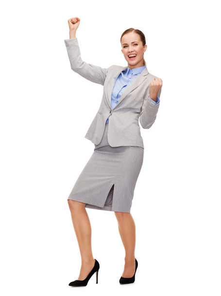Happy businesswoman with hands up - Фото, зображення