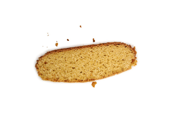 Slice of gluten free bread and crumbs isolated on white background. Top view. - Photo, Image