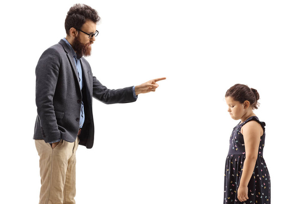 Father reprimending a little girl with his finger isolated on white background - Photo, image