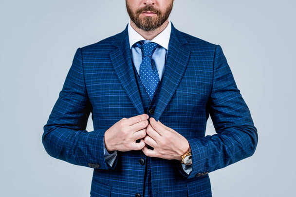 Go somewhere great. Monochromatic ensemble. Blue suit worn with necktie. Formal male fashion. Classic fashion style. Elegant formalwear. Menswear. Business outfit. Work meeting. Perfect for office - Photo, image