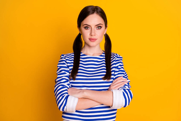 Portrait of her she nice-looking attractive pretty lovely content brown-haired girl folded arms isolated over bright vivid shine vibrant yellow color background - Foto, immagini