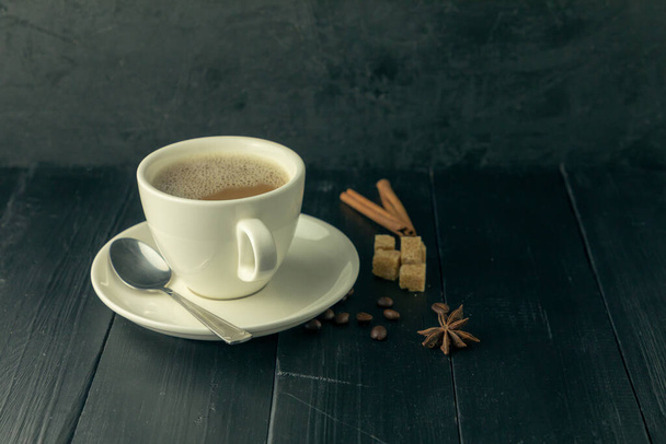 Black Coffee, white dishes in natural sun light with spices. - 写真・画像