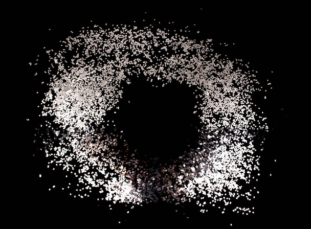 Black and white background. Frame made of white and silver metallic sequins on a black background. - Foto, Imagen