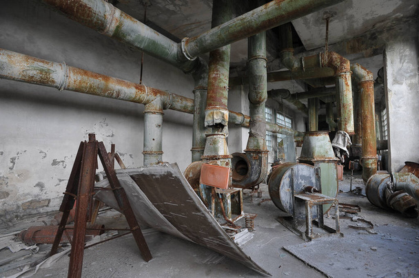 Radioactive dump in abandoned plant Jupiter in Chernobyl zone near ghost town Pripyat, Ukraine - Photo, Image