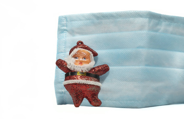 Corona virus Natale Babbo Natale con maschera blu per proteggere contro il virus della corona - Foto, immagini
