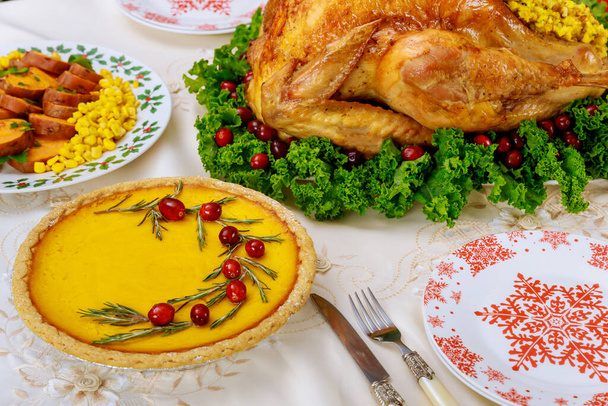 Christmas turkey dinner served with pumpkin pie and sweet potatoes. New Year holiday. - Fotoğraf, Görsel