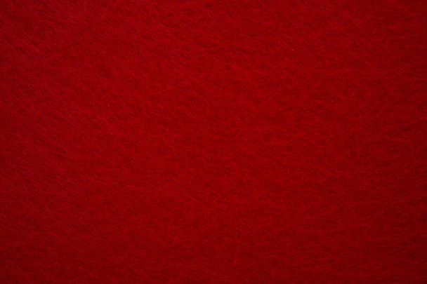 Felt background in red color useful for Christmas backgrounds. Hight quality photo - Photo, Image