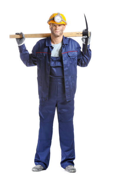 Miner man with pick axe on white background - Photo, Image