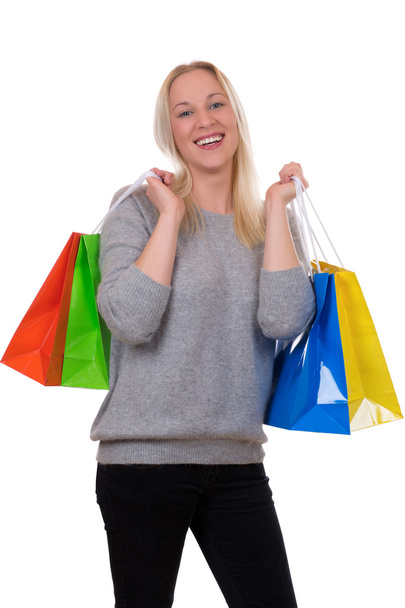 Young blond woman with shopping bags - Foto, Imagem